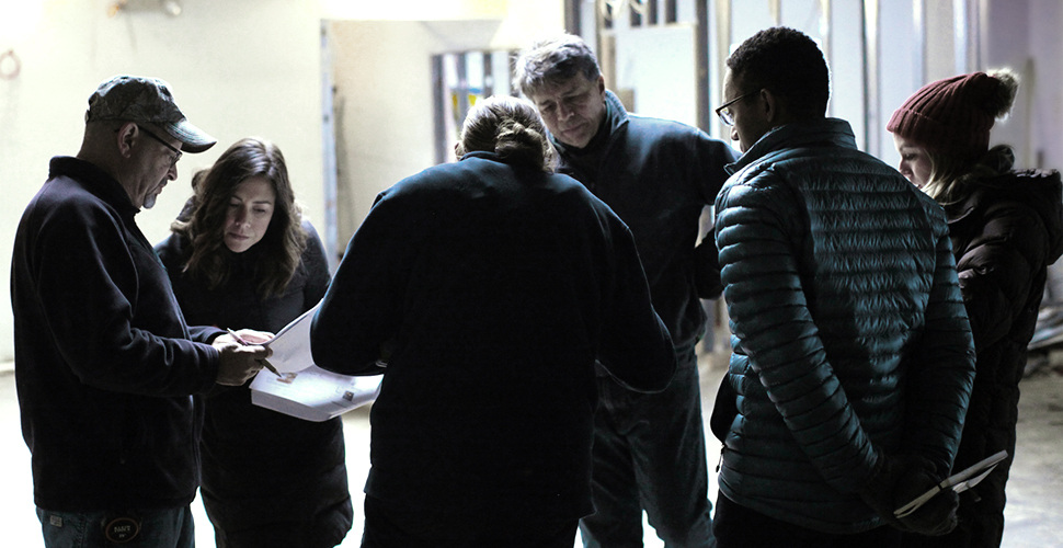 NextFab staff inspecting the progress on the makerspace facility