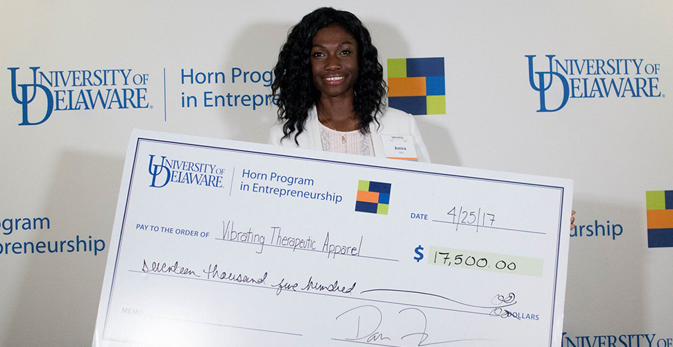 Amira Idris with her University of Delaware Hen Hatch award