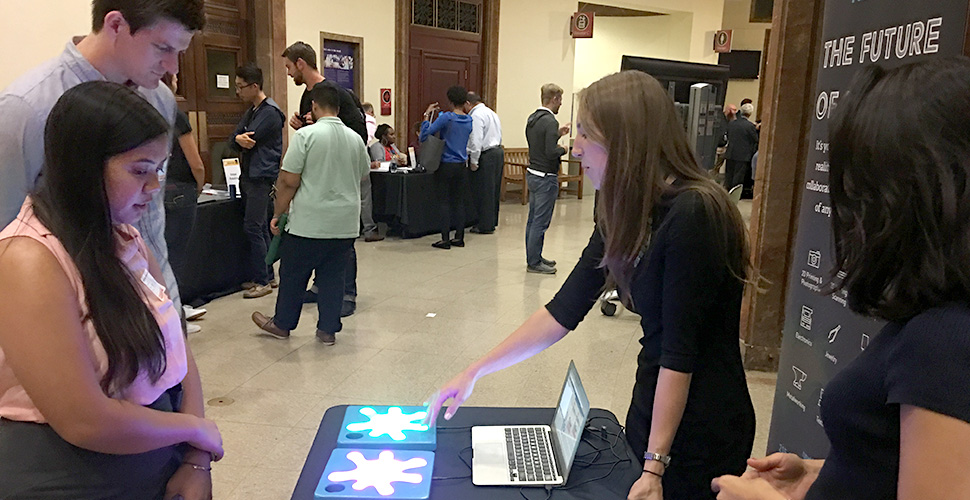 Unruly Studios shows Splats, kid coded interactive tiles, made at NextFab makerspace