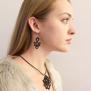 Linda Celestian - contemporary laser-cut acrylic and wood pendants and earrings 2