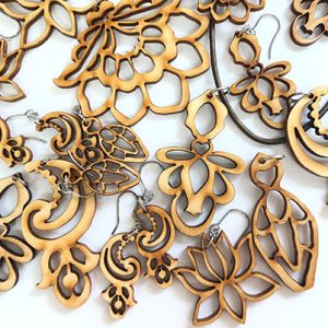 Linda Celestian - contemporary laser-cut acrylic and wood pendants and earrings 3