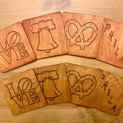 Philly Phlights - handcrafted wooden products, including coasters, bottle openers, and drink flights 1